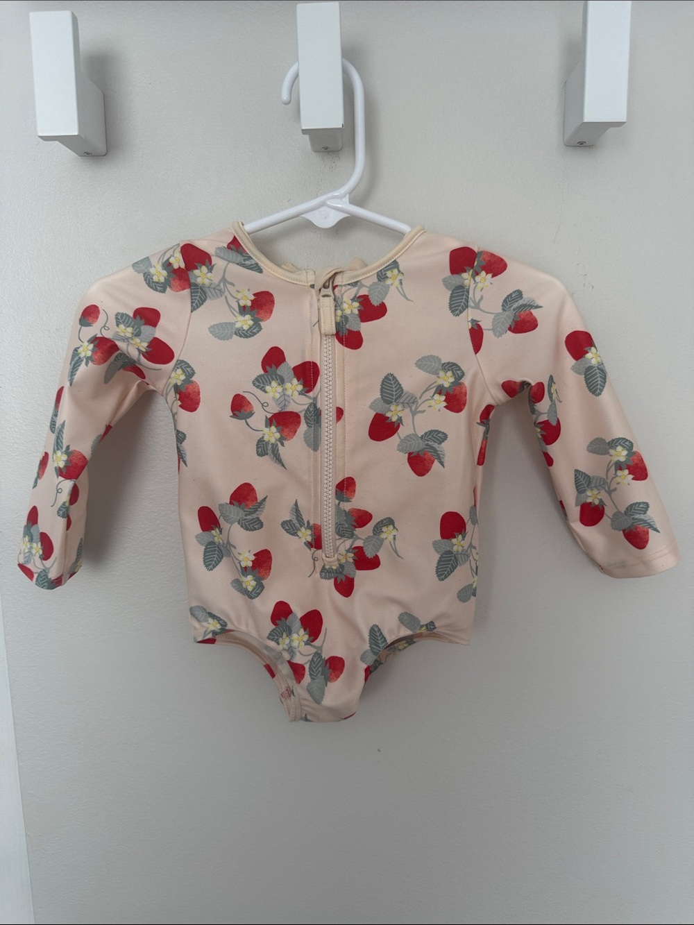 H&M Peach-Pink Long-Sleeve One-Piece with Red Strawberry Print